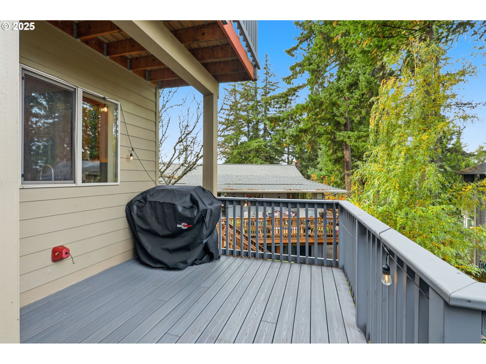 937 Southwest Florence Court Gresham, OR 97080 - Photo 34 of 47 a view of a wooden deck with a bench