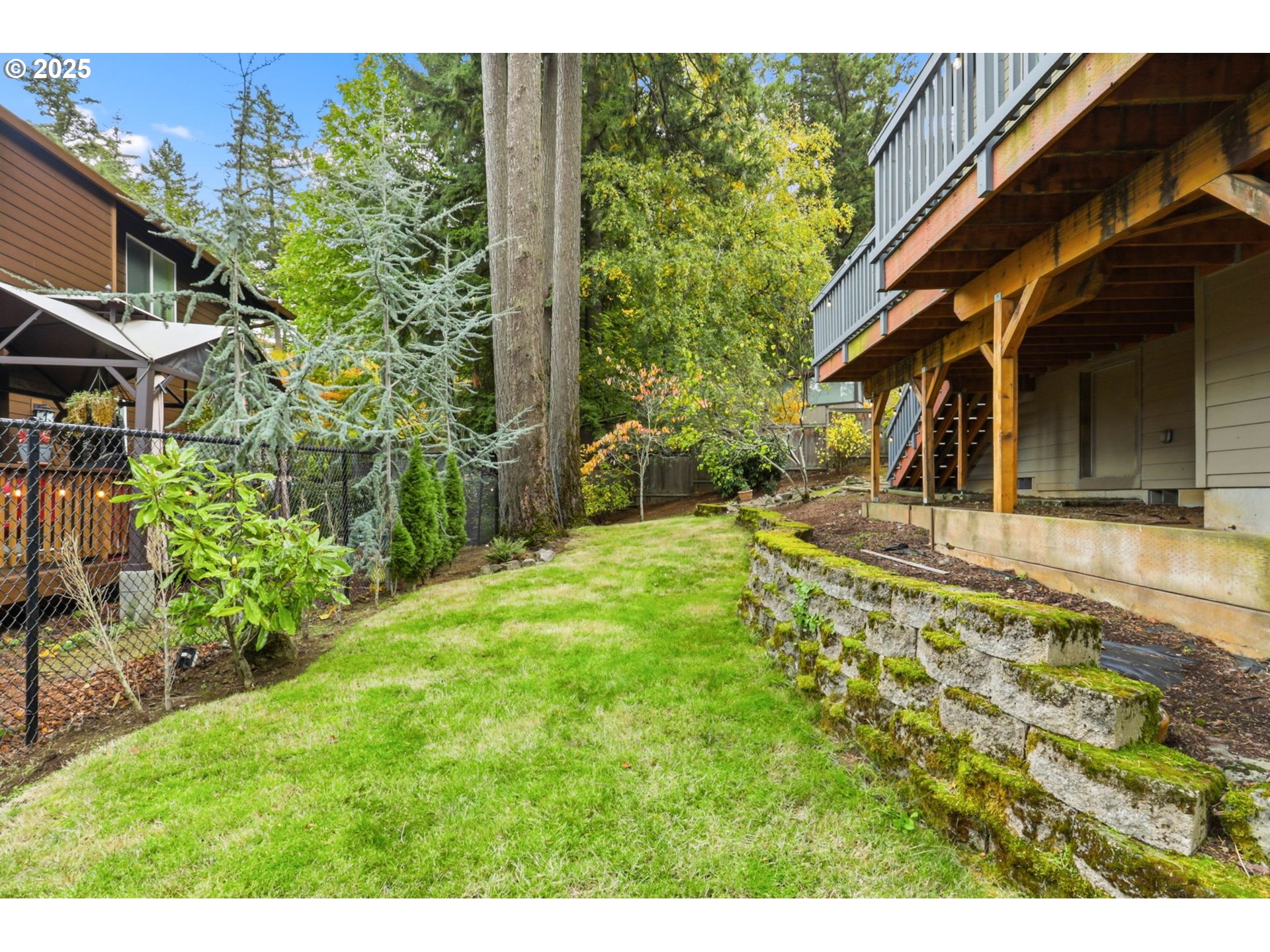 937 Southwest Florence Court Gresham, OR 97080 - Photo 38 of 47 a view of a house with a yard
