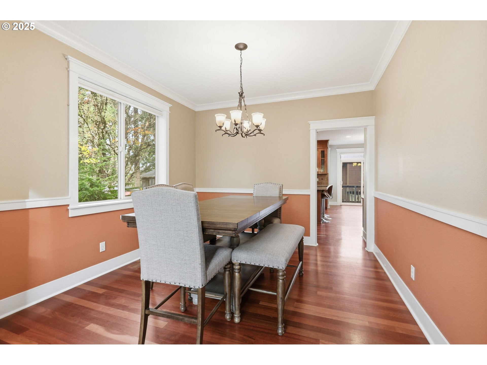 937 Southwest Florence Court Gresham, OR 97080 - Photo 4 of 47 a view of a dining room with furniture window and wooden floor