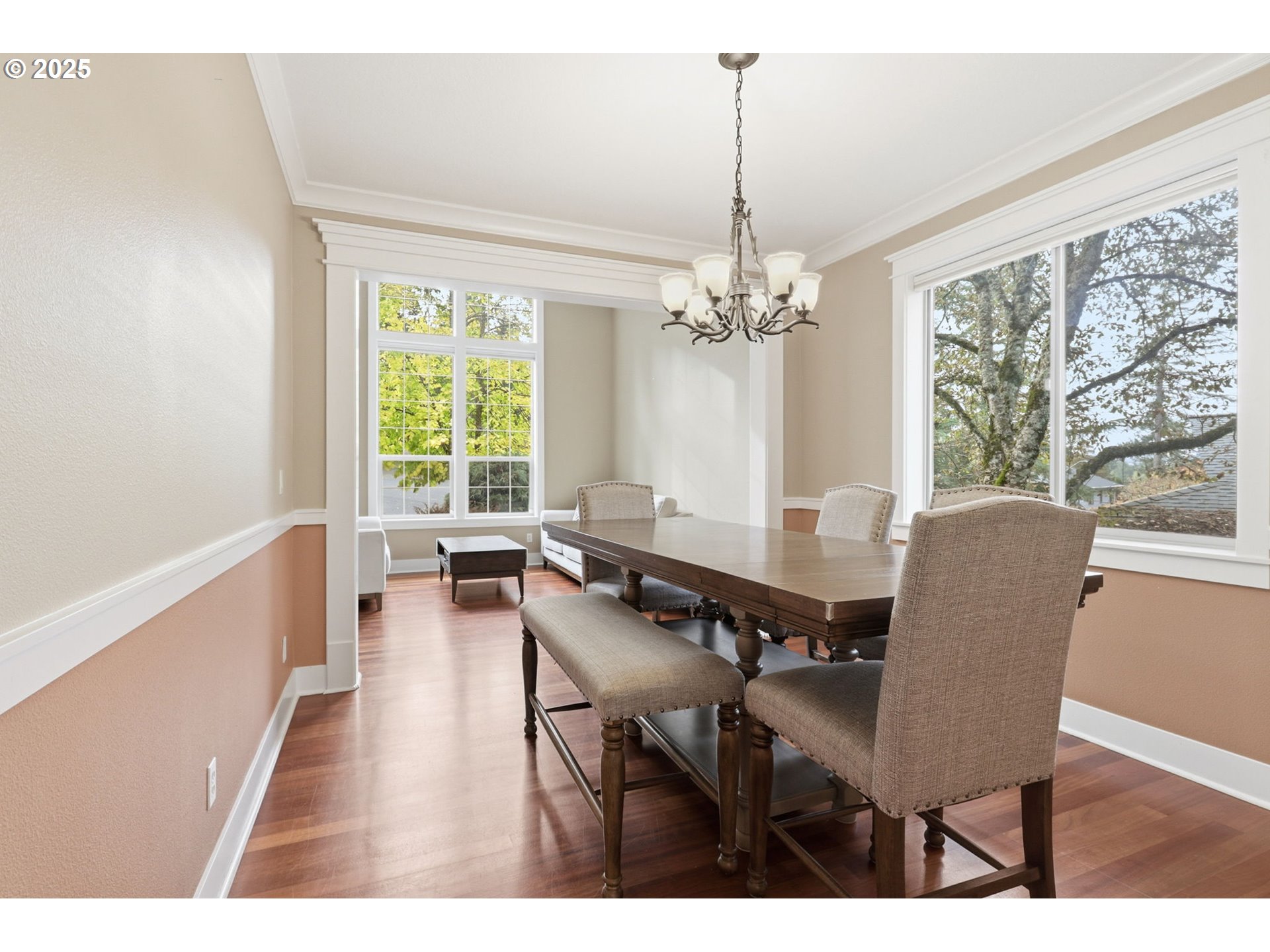 937 Southwest Florence Court Gresham, OR 97080 - Photo 5 of 47 a dining room with furniture a chandelier and wooden floor