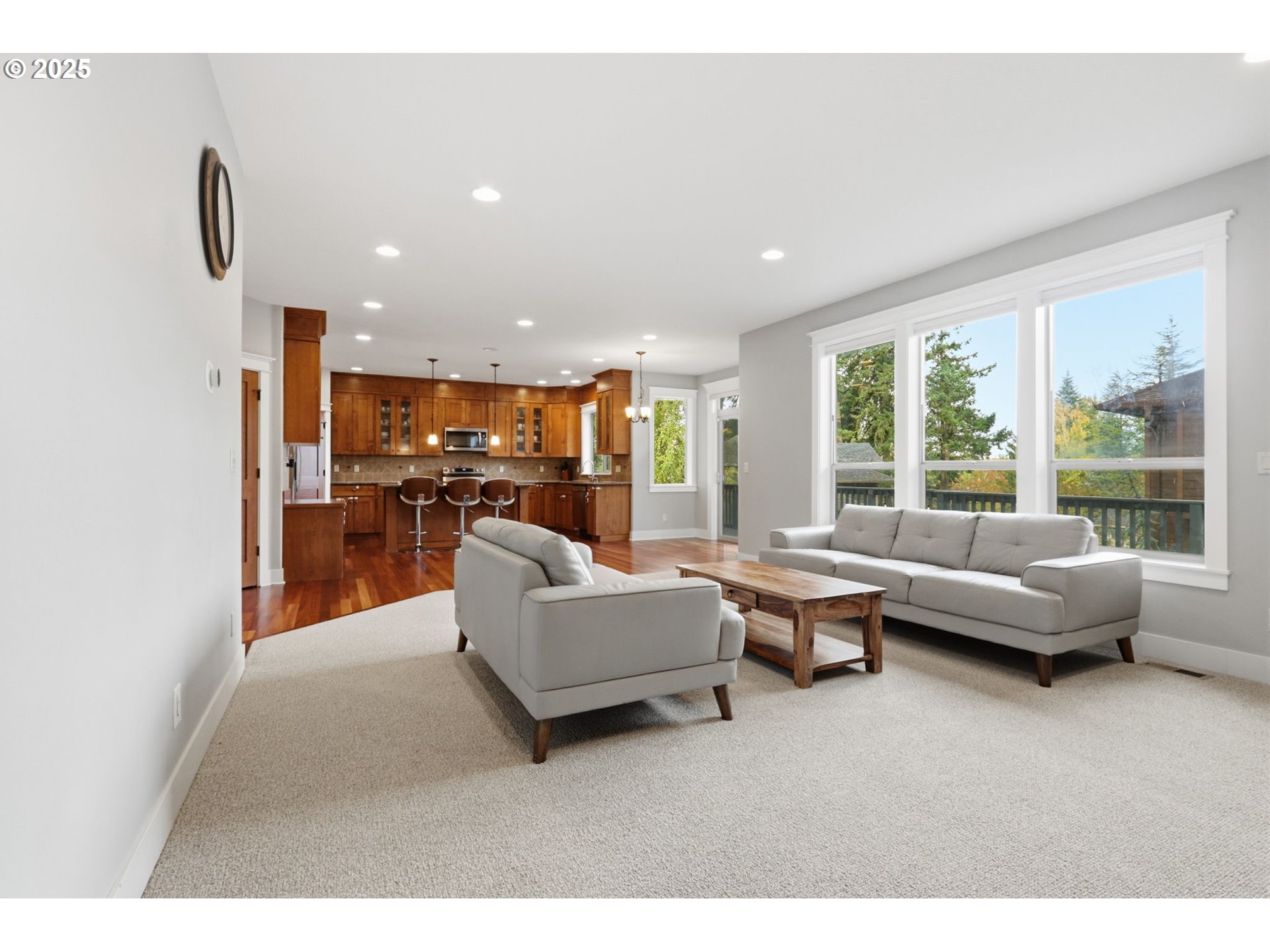 937 Southwest Florence Court Gresham, OR 97080 - Photo 10 of 47 a living room with furniture and large windows