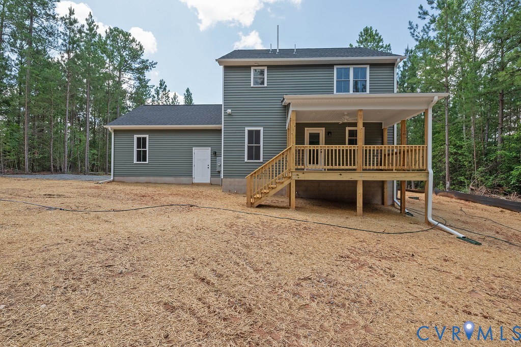 3844 Maidens Road Powhatan, VA 23139 - Photo 46 of 49 Rear view of house featuring stairway and roof wit
