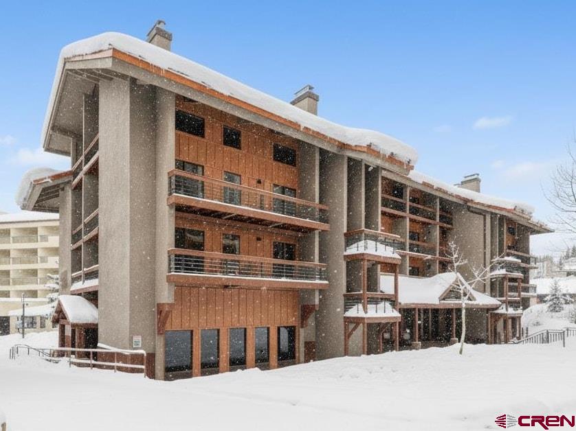 11 Emmons Road, Unit 322 Crested Butte, CO 81225 - Photo 17 of 21 a front view of a building