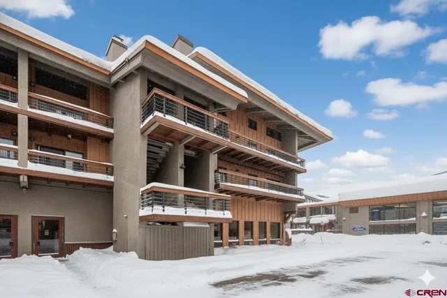 a view of the street with sitting area