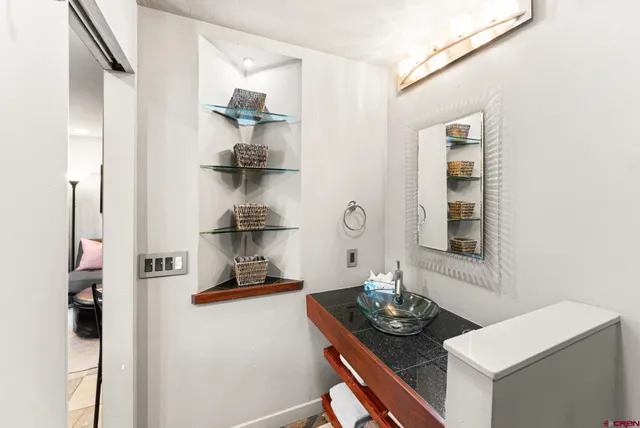 a dining room with table and chairs