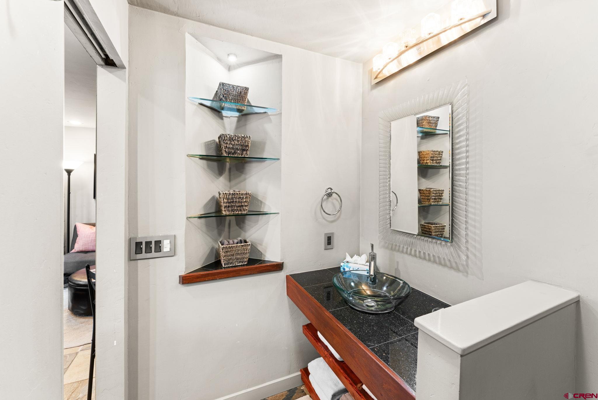 11 Emmons Road, Unit 322 Crested Butte, CO 81225 - Photo 10 of 21 a dining room with table and chairs
