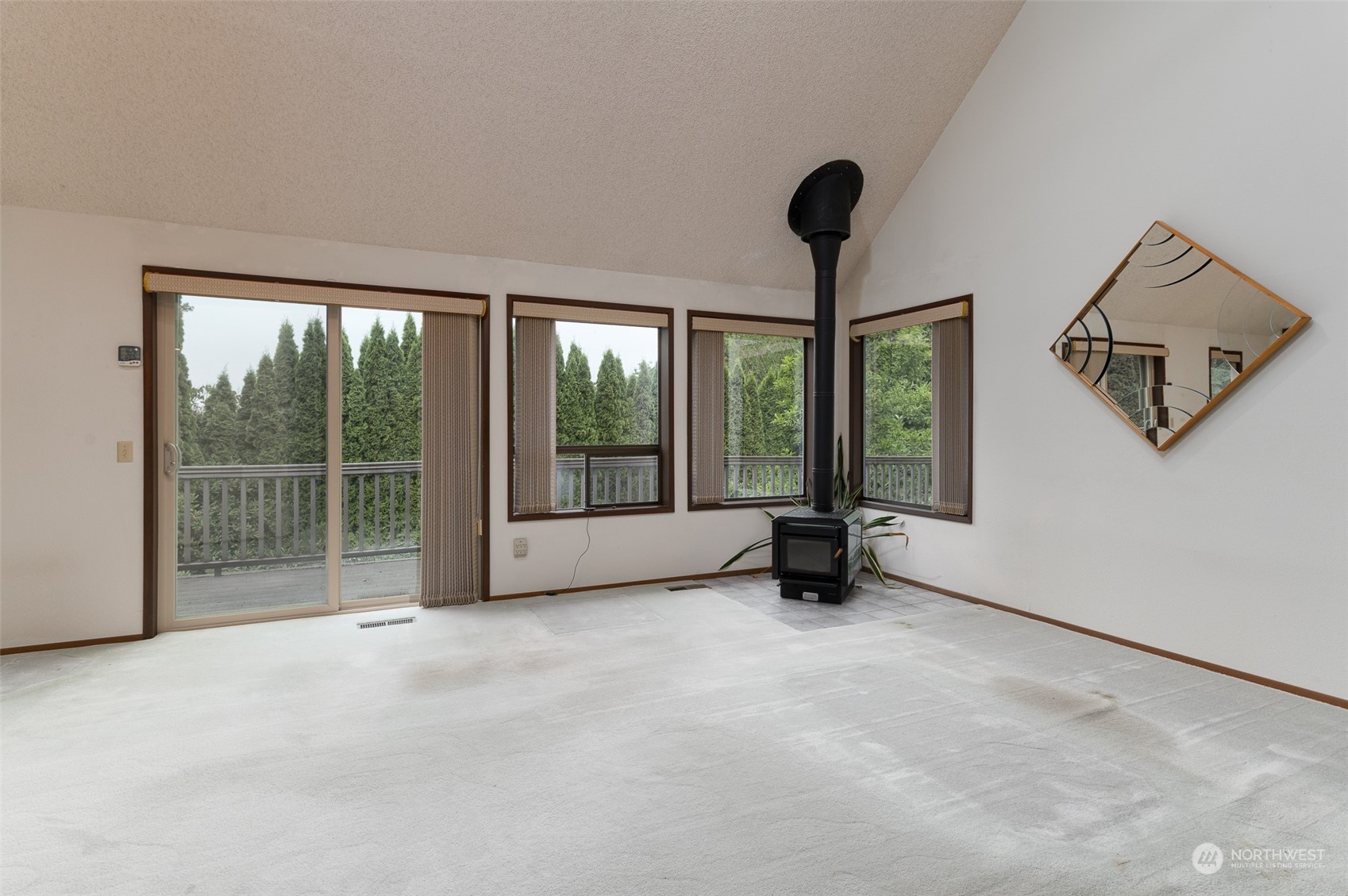 243 Bayside Road Bellingham, WA 98225 - Photo 8 of 22 a view of an empty room with windows
