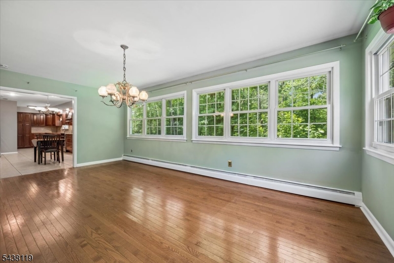 335 Drakestown Road Long Valley, NJ 07853 - Photo 15 of 34 a view of an empty room with window and wooden floor