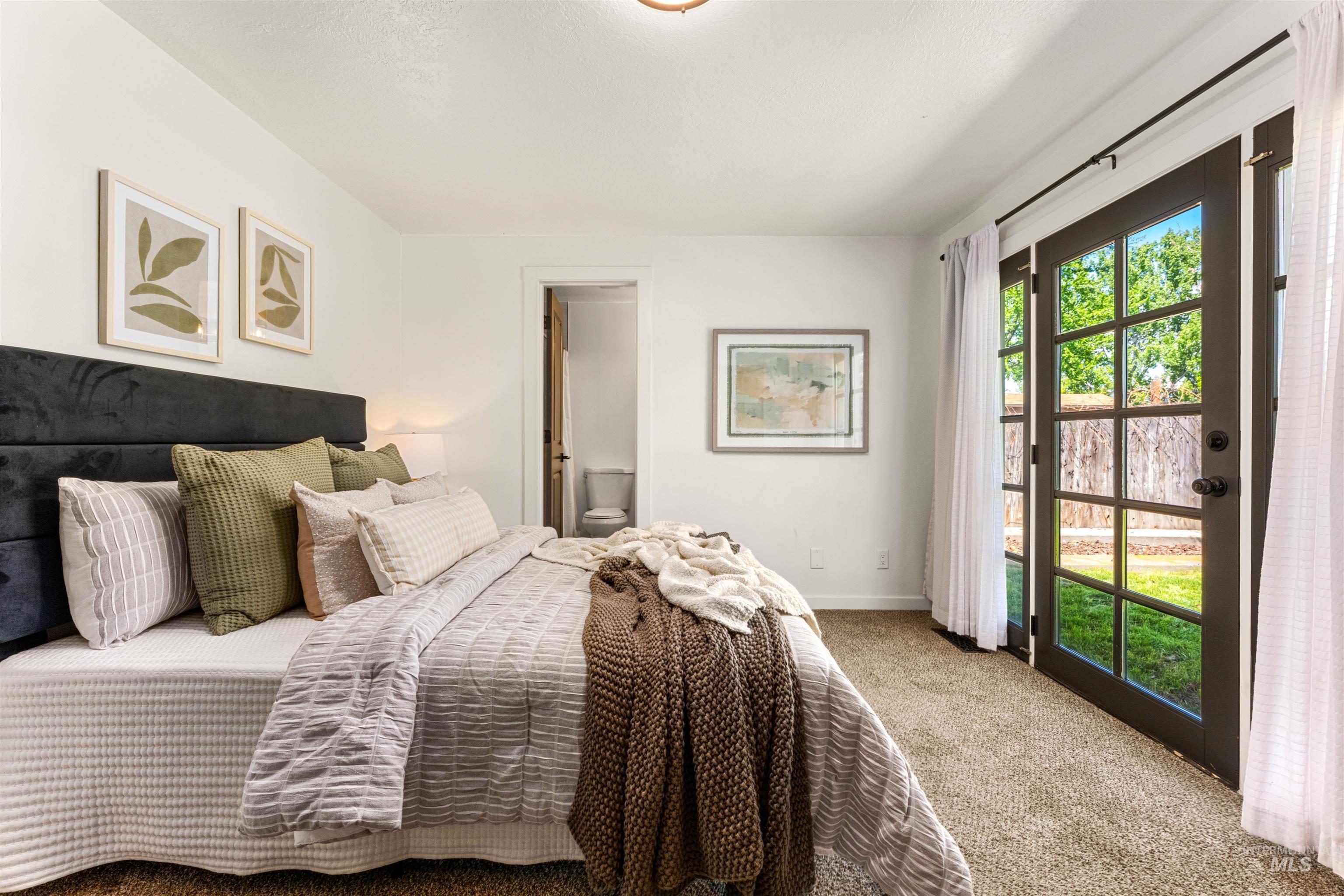4700 Jennifer Street Boise, ID 83704 - Photo 19 of 39 Bedroom with direct exterior access through French doors