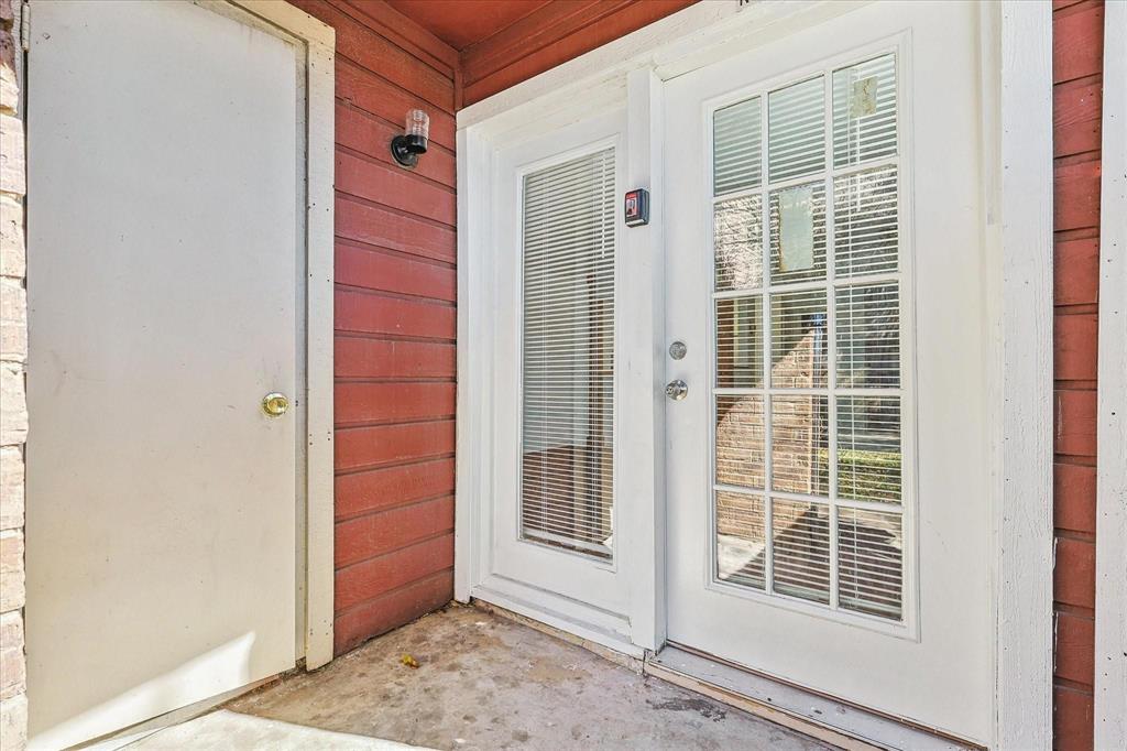 9821 Walnut Street, Unit 101 Dallas, TX 75243 - Photo 2 of 17 a view of front door of house