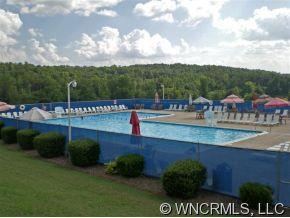 190 Kings Grant Road, Unit 211 Rutherfordton, NC 28139 - Photo 11 of 12 a view of a garden with lawn chairs