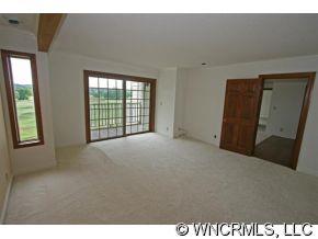 190 Kings Grant Road, Unit 211 Rutherfordton, NC 28139 - Photo 8 of 12 a view of an empty room with a window