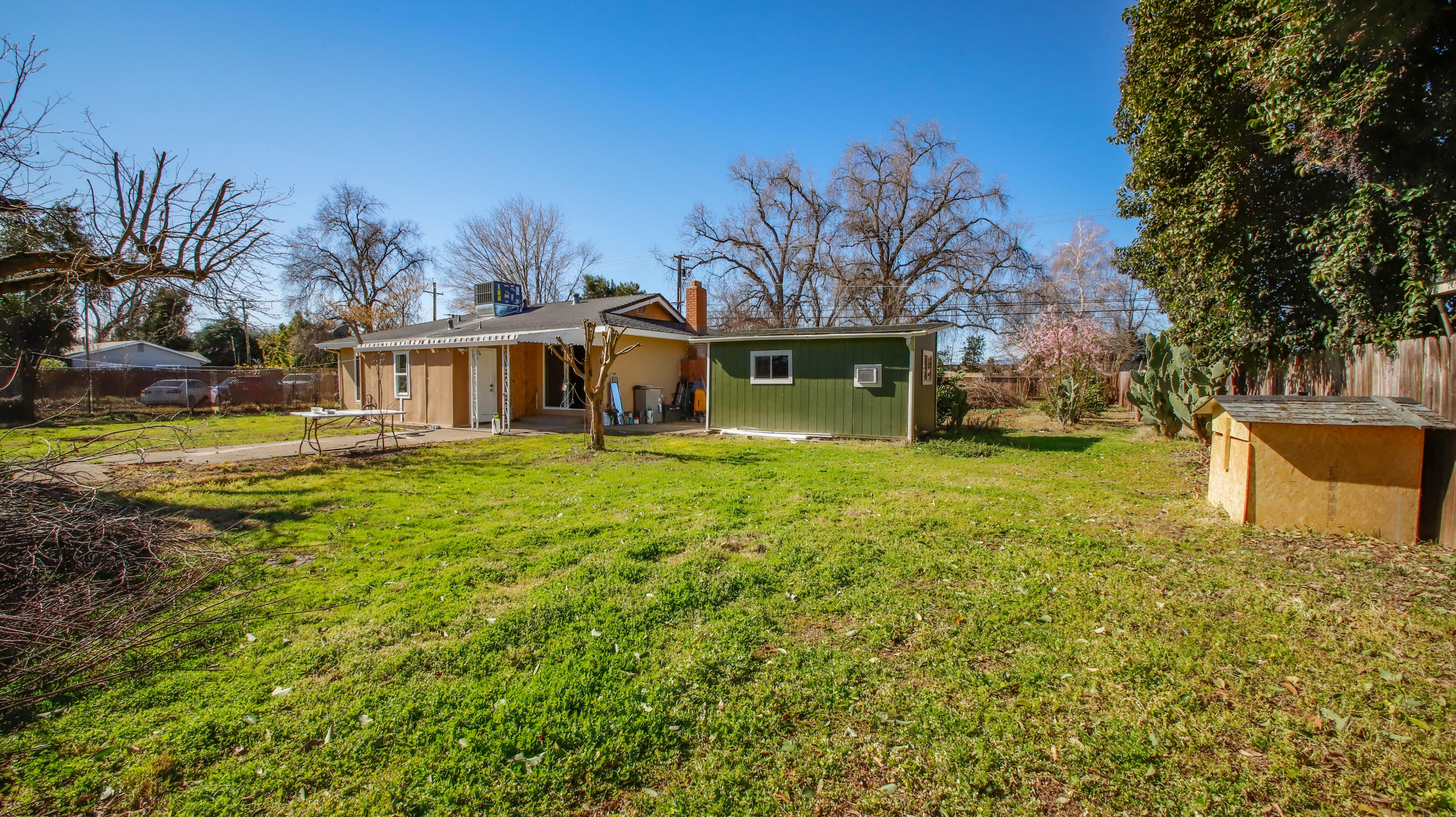 7441 Pacheco Road Redding, CA 96002 - Photo 17 of 19 a view of a house with a yard