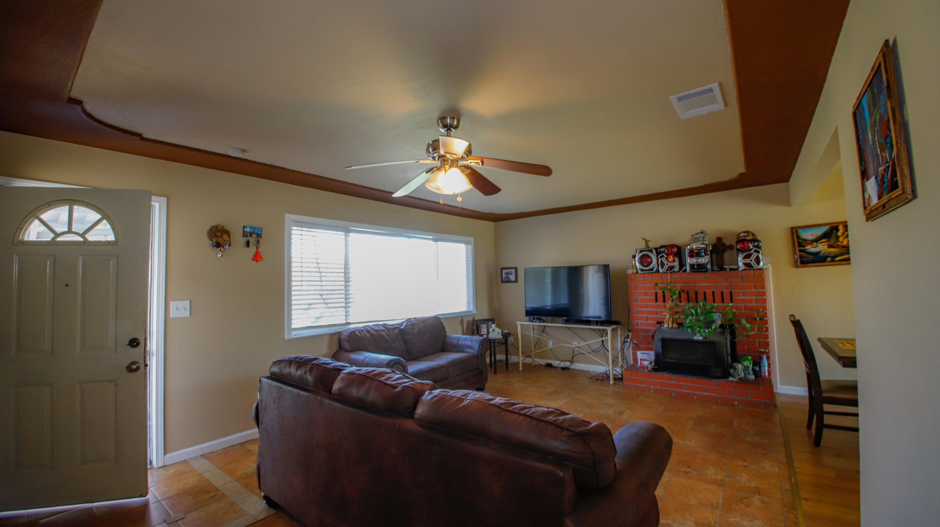 7441 Pacheco Road Redding, CA 96002 - Photo 2 of 19 a living room with furniture and a flat screen tv