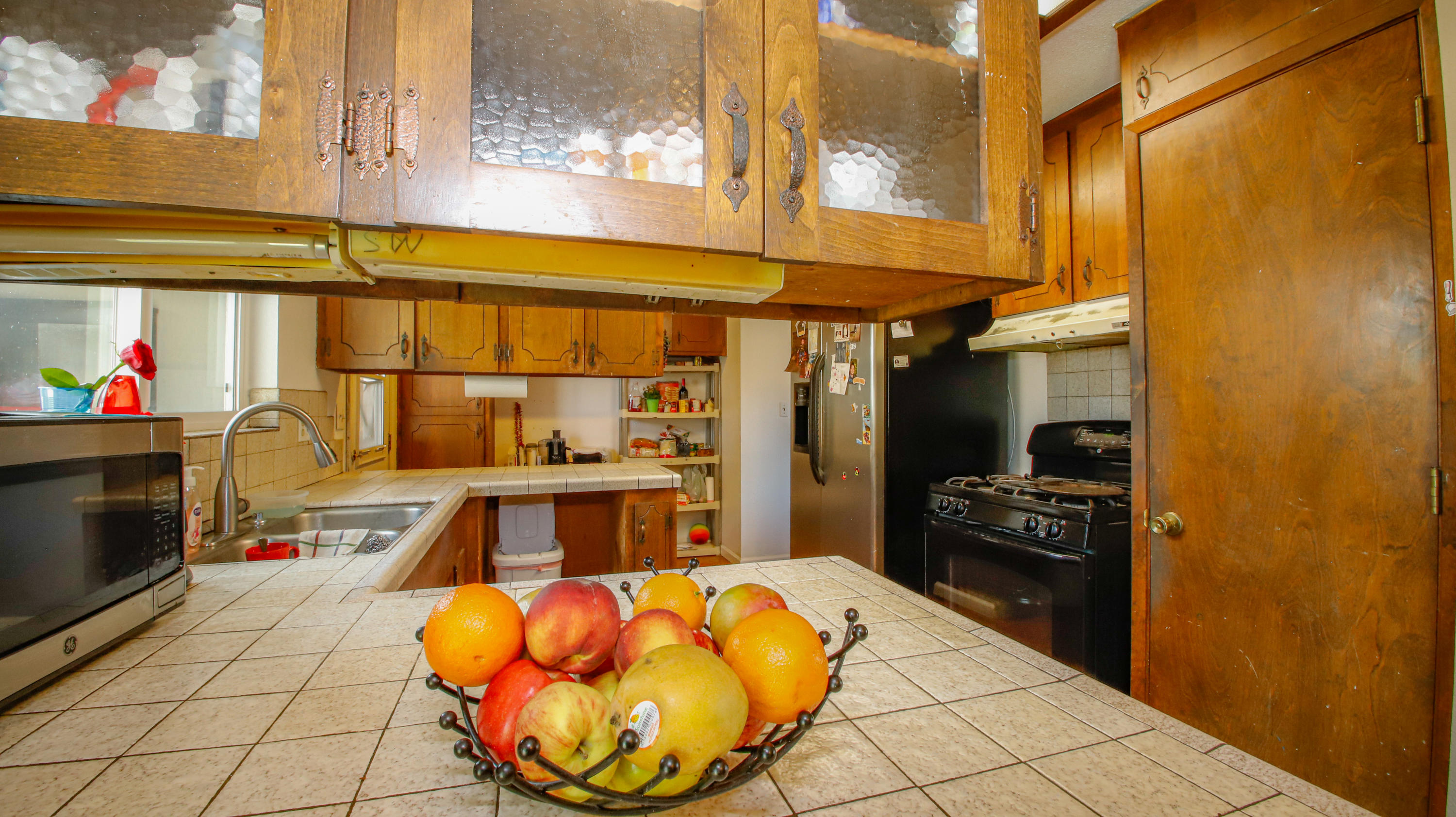 7441 Pacheco Road Redding, CA 96002 - Photo 7 of 19 a view of a kitchen with a sink and cabinets
