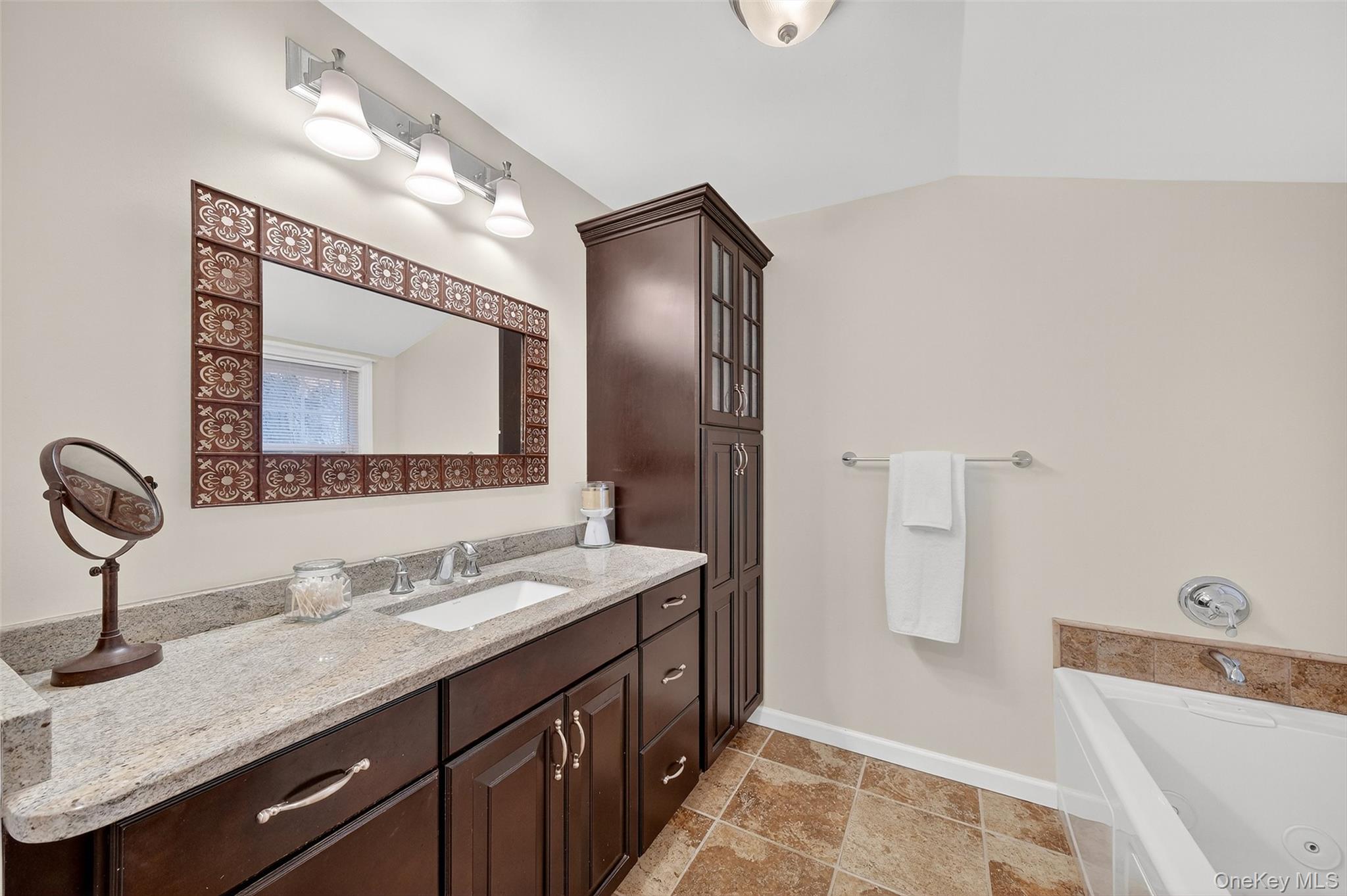 3 Crosshill Road Mahopac, NY 10541 - Photo 20 of 39 a bathroom with a sink and a mirror