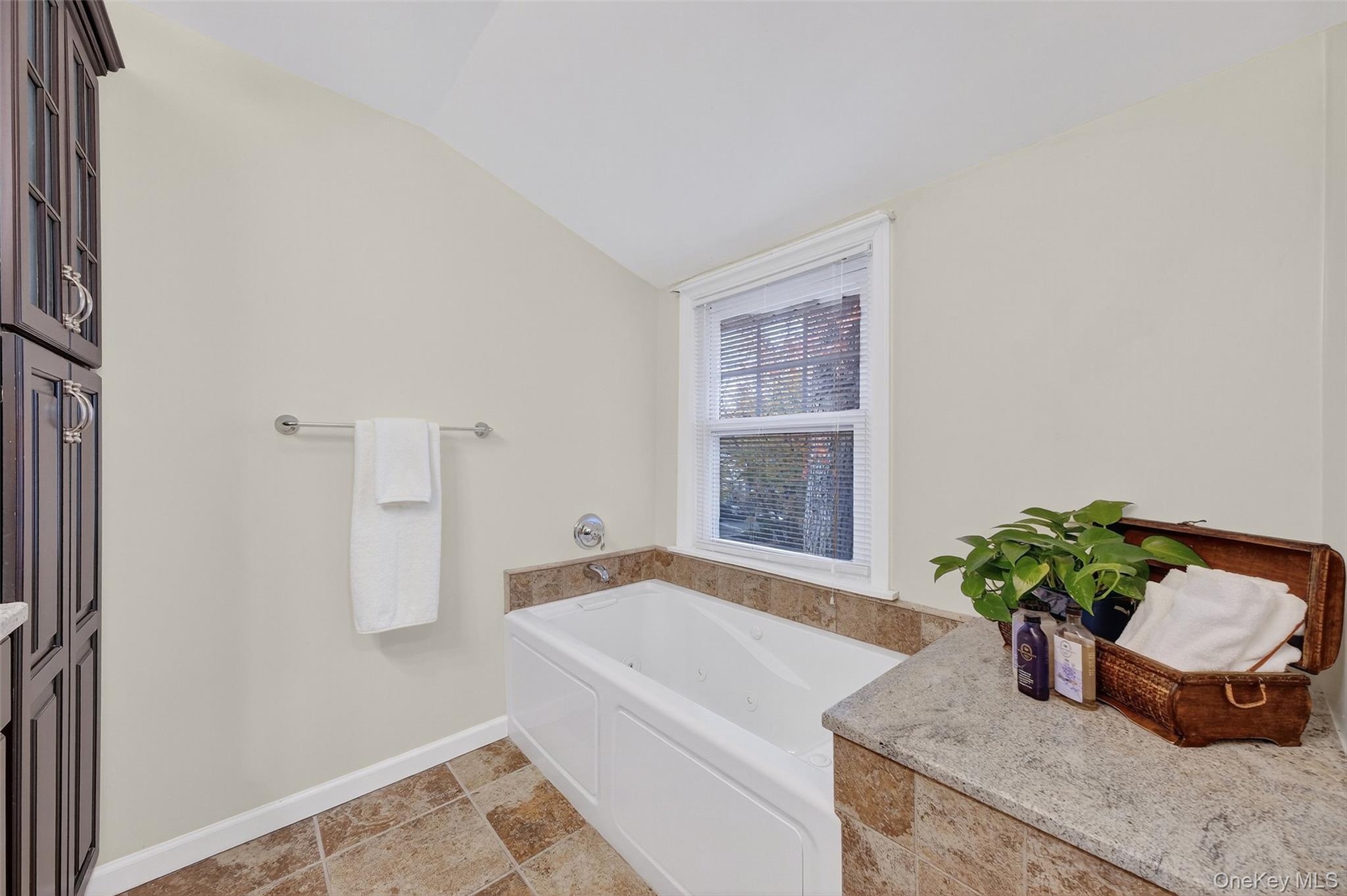 3 Crosshill Road Mahopac, NY 10541 - Photo 21 of 39 a room with a potted plant and a window