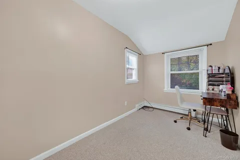 a room with furniture and windows