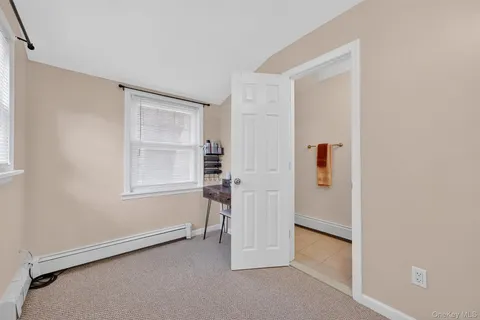 a view of empty room with windows