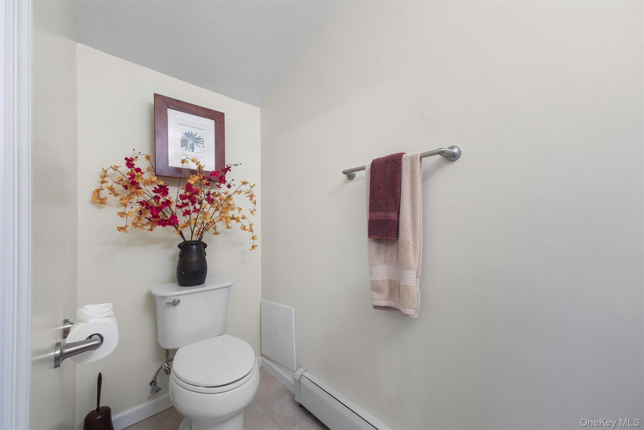 3 Crosshill Road Mahopac, NY 10541 - Photo 32 of 39 a bathroom with a toilet sink and mirror