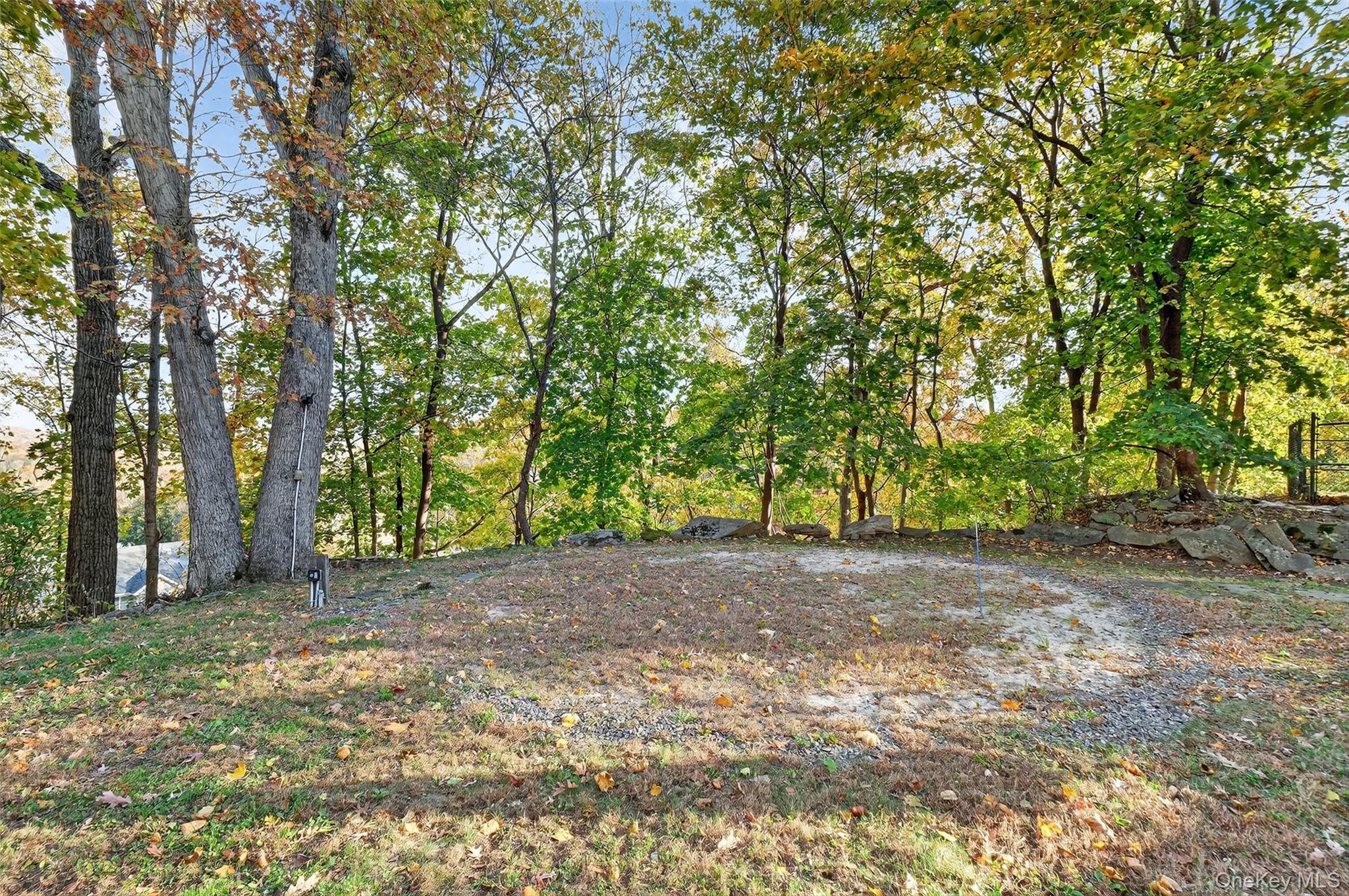 3 Crosshill Road Mahopac, NY 10541 - Photo 36 of 39 a view of a yard with large trees
