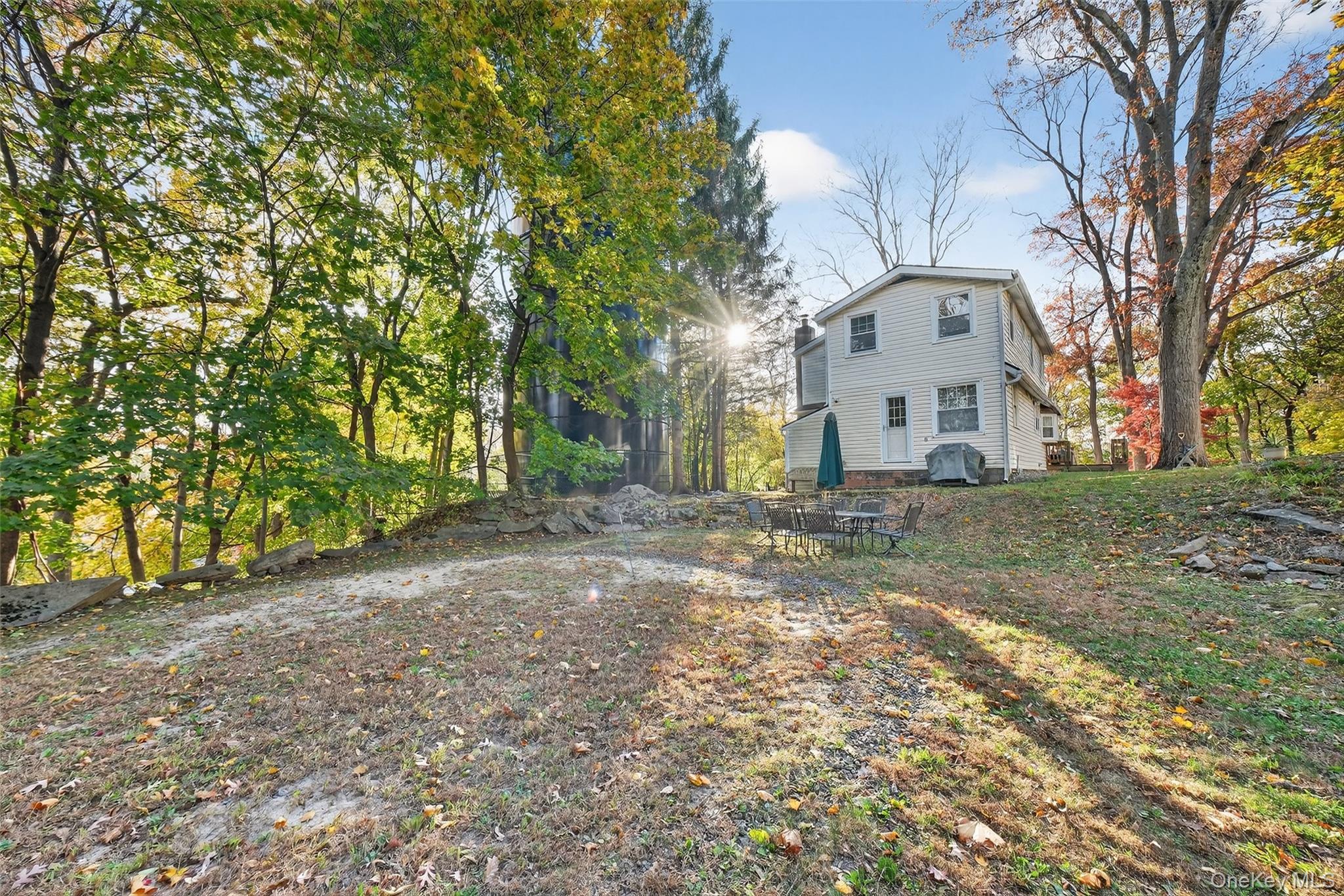 3 Crosshill Road Mahopac, NY 10541 - Photo 38 of 39 a view of a house with a yard