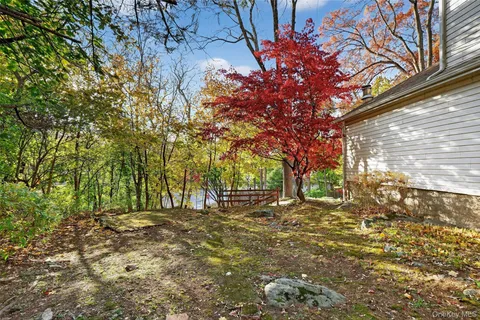 a backyard of a house with lots of green space
