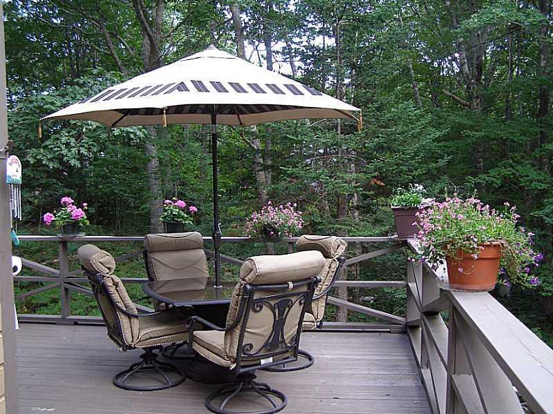 766 Ocean Point Road East Boothbay, ME 04544 - Photo 5 of 24 Patio/Deck. The deck accessible from...