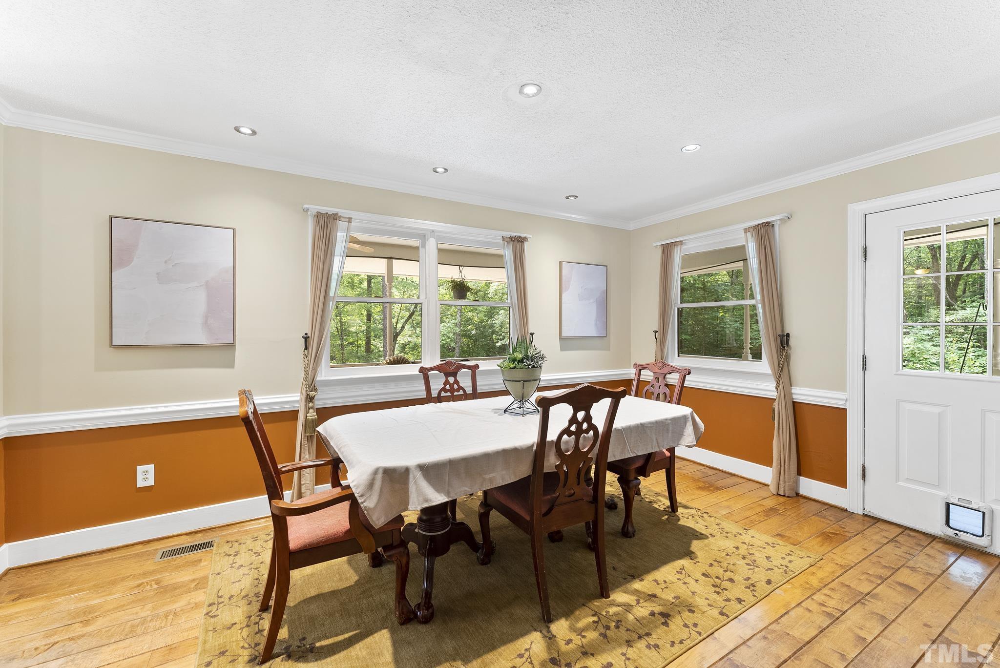 11416 Hickory Grove Church Road Raleigh, NC 27613 - Photo 13 of 40 a dining room with furniture and window