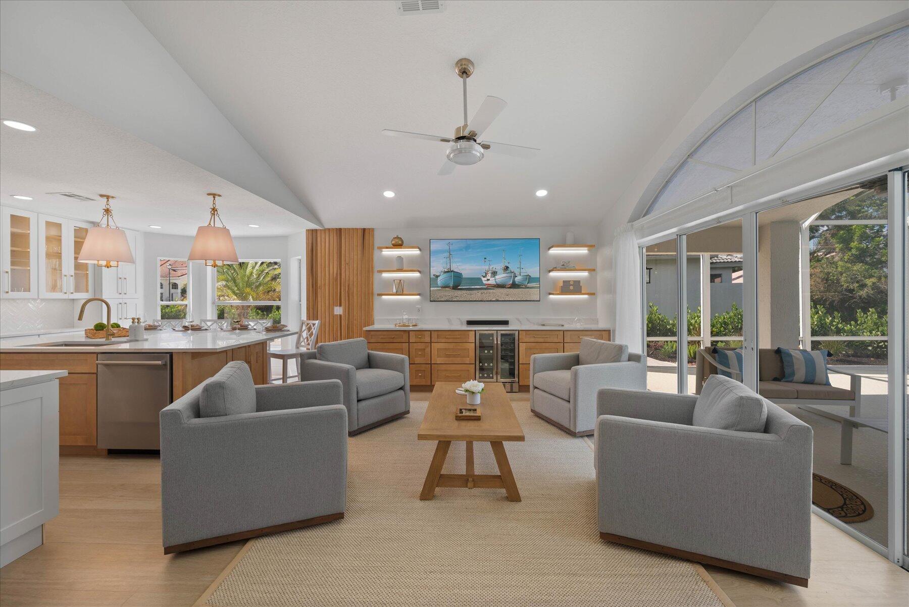 4185 Sea Mist Way Wellington, FL 33449 - Photo 13 of 50 a living room with furniture and a large window