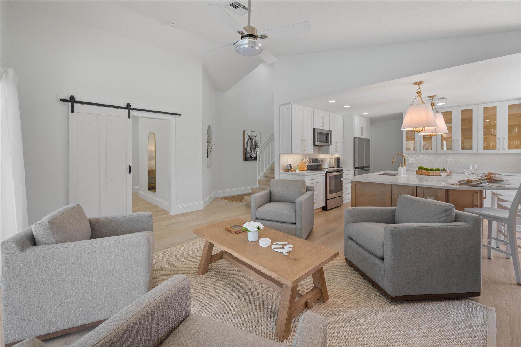 4185 Sea Mist Way Wellington, FL 33449 - Photo 18 of 50 a living room with furniture and a view of kitchen