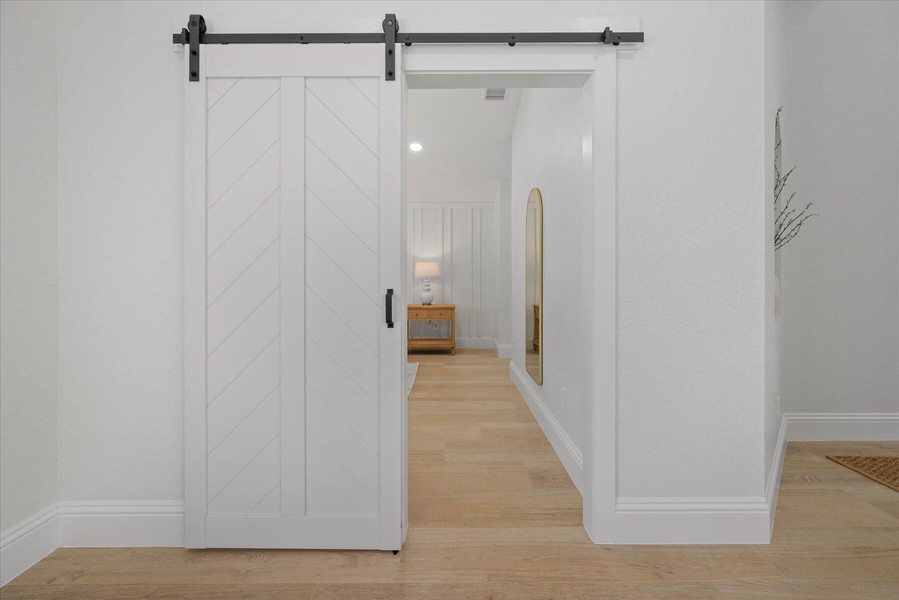 4185 Sea Mist Way Wellington, FL 33449 - Photo 19 of 50 a view of a bathroom from the hallway