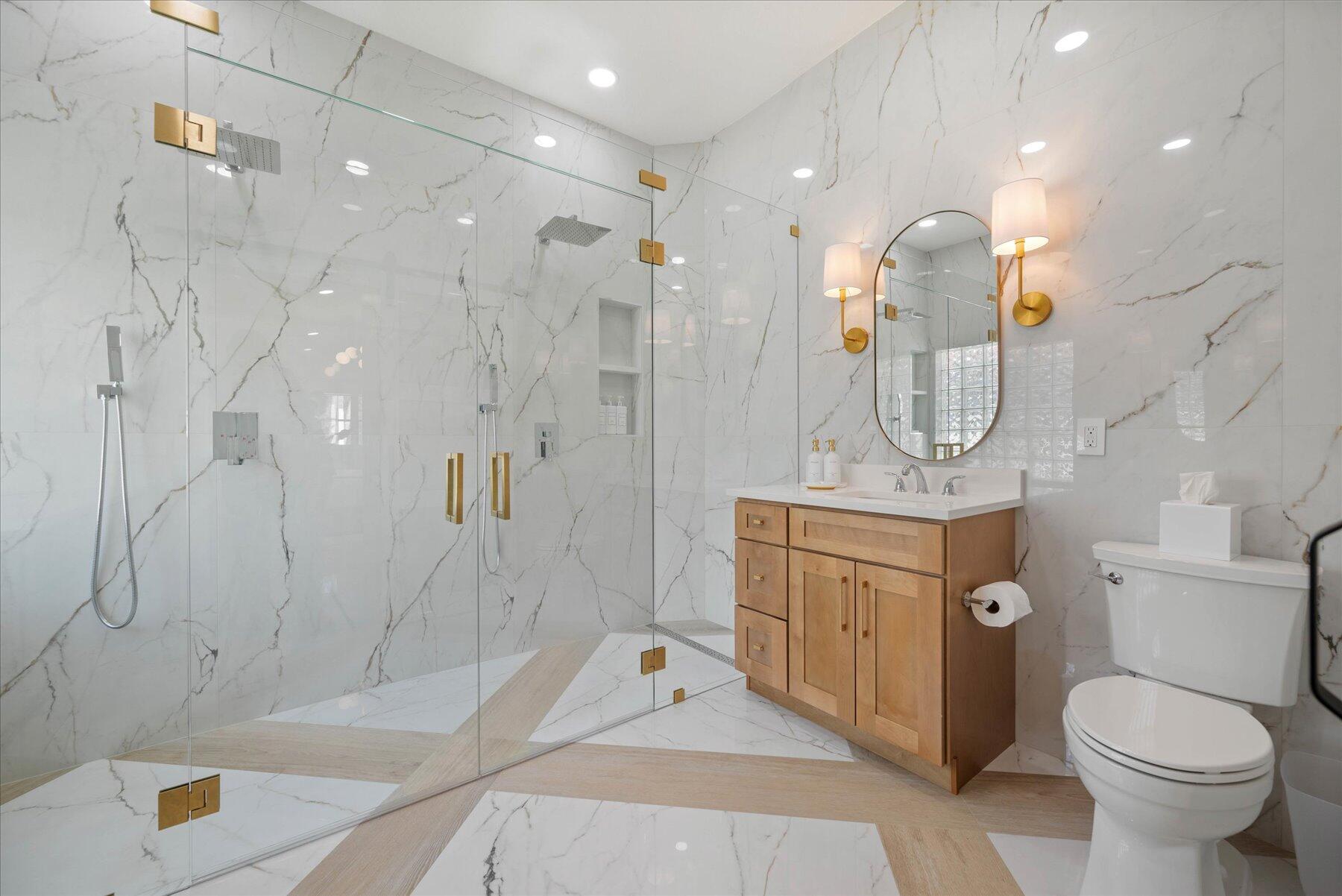 4185 Sea Mist Way Wellington, FL 33449 - Photo 27 of 50 a bathroom with a sink a toilet and shower