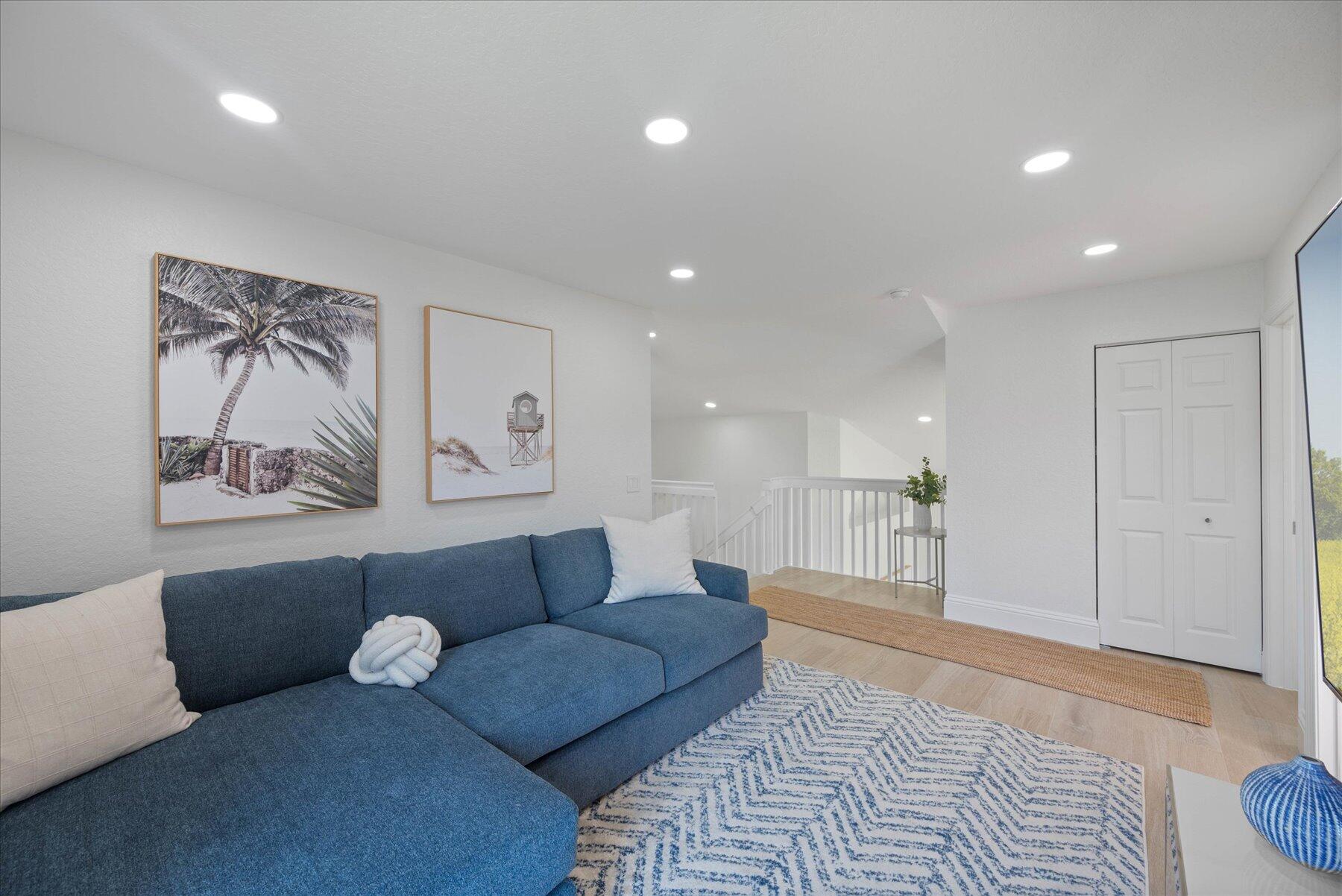 4185 Sea Mist Way Wellington, FL 33449 - Photo 35 of 50 a living room with furniture and a rug