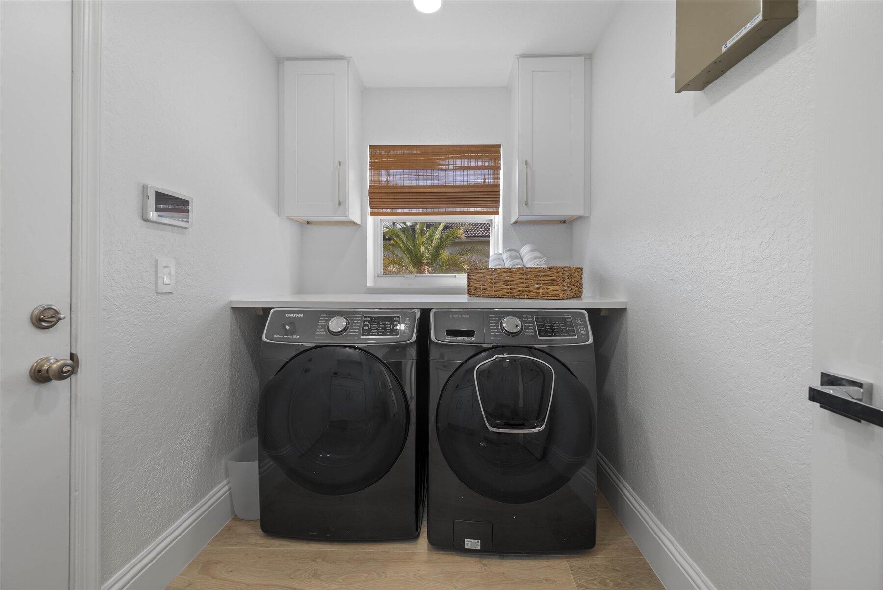 4185 Sea Mist Way Wellington, FL 33449 - Photo 41 of 50 a utility room with dryer and washer