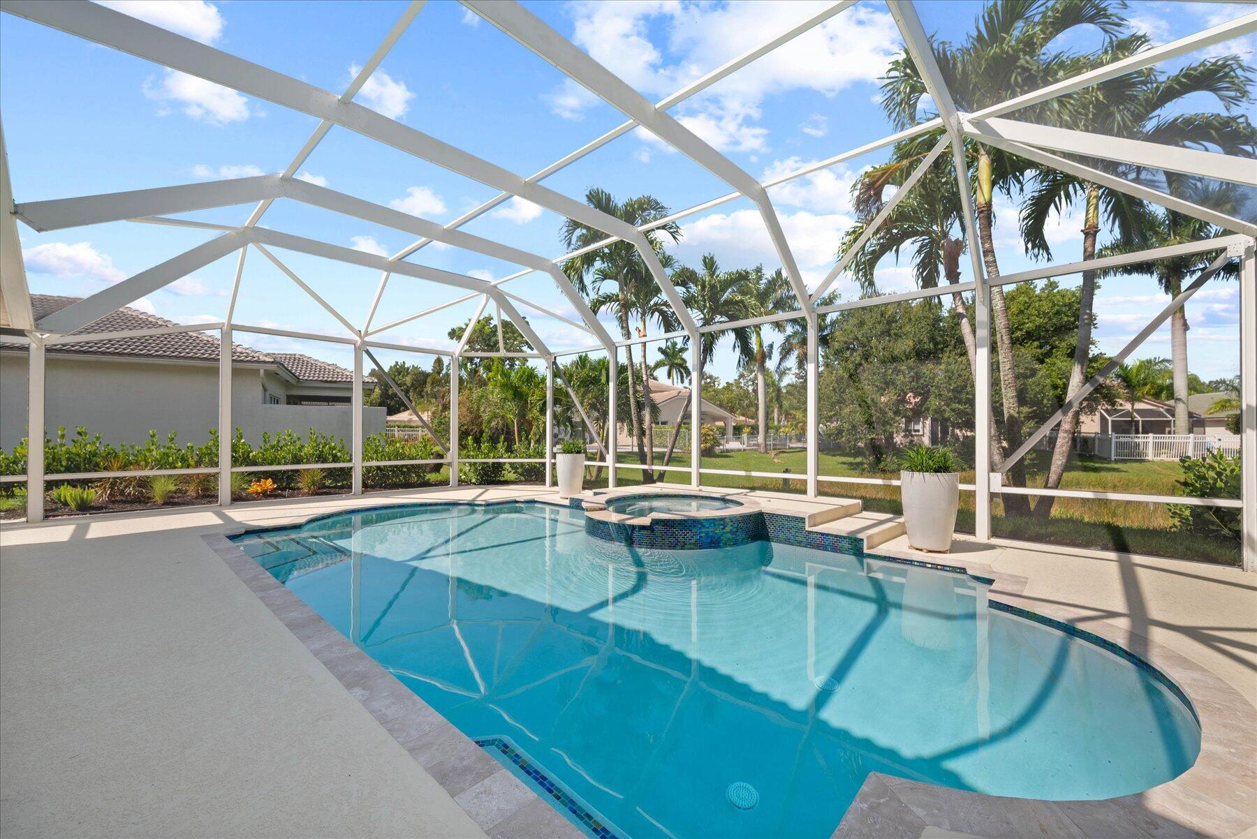 4185 Sea Mist Way Wellington, FL 33449 - Photo 45 of 50 a view of a swimming pool with a patio