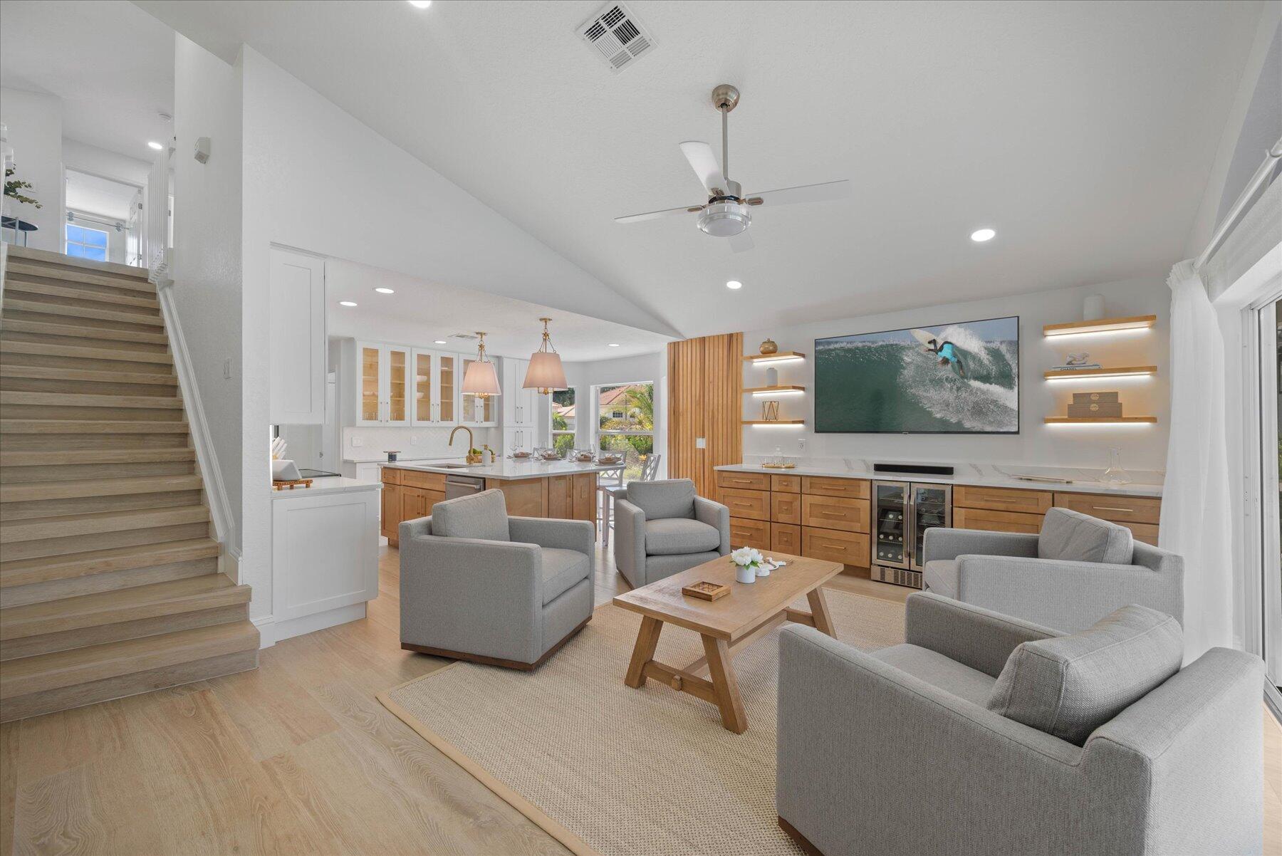 4185 Sea Mist Way Wellington, FL 33449 - Photo 8 of 50 a living room with furniture and a large window