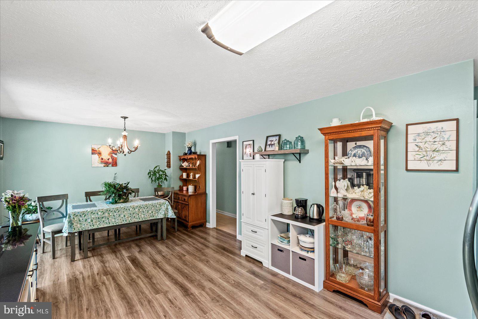 804 Buggy Lane Rochelle, VA 22738 - Photo 16 of 50 a living room with furniture and wooden floor