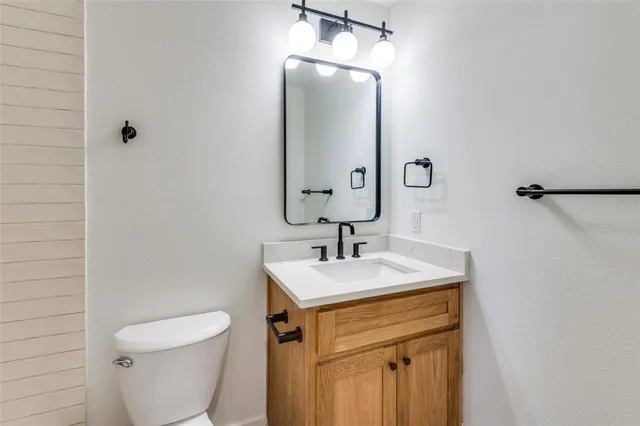 a bathroom with a sink and a toilet