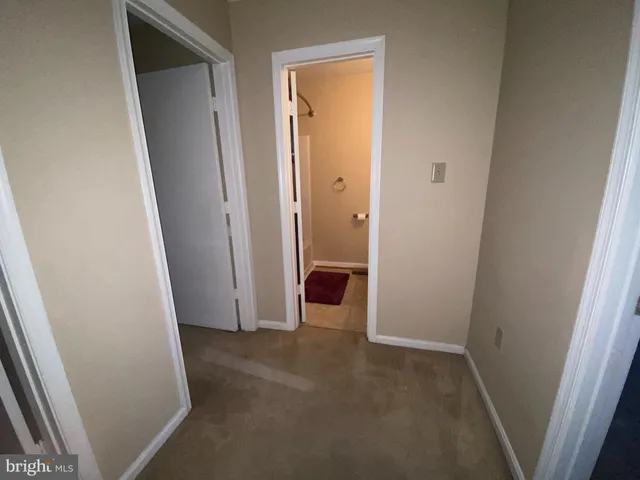 an empty room and windows