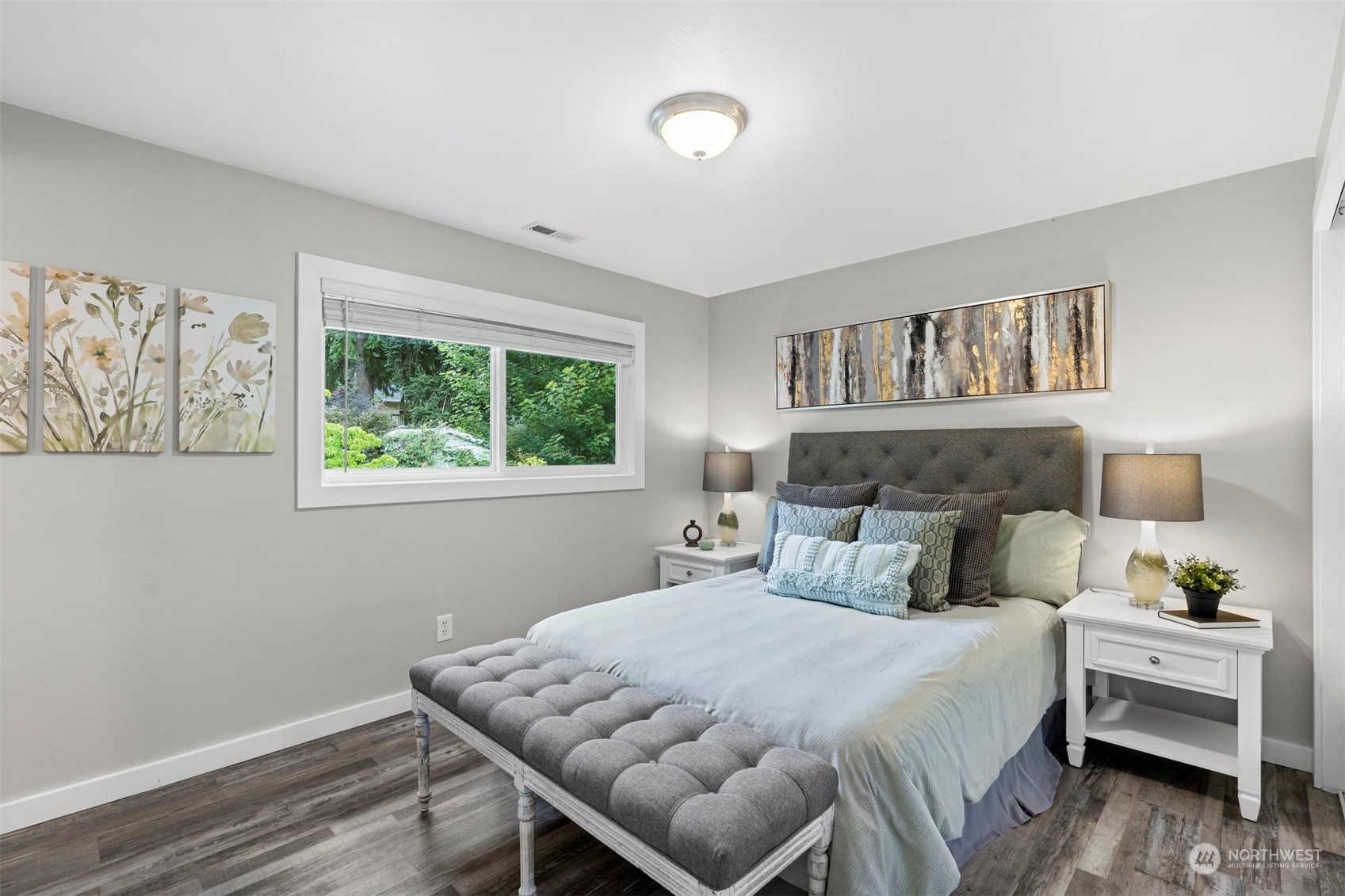 24301 7th Place West Bothell, WA 98021 - Photo 13 of 40 a bedroom with a bed and wooden floor