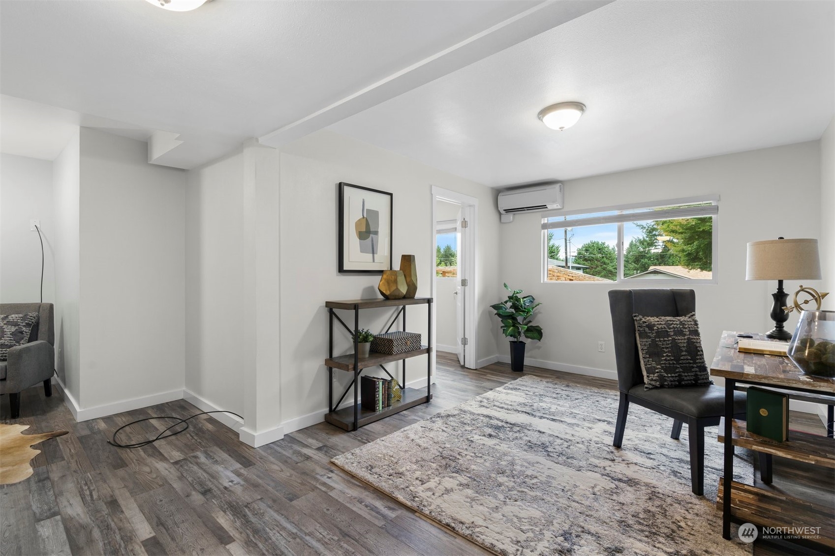 24301 7th Place West Bothell, WA 98021 - Photo 15 of 40 a view of a workspace with furniture and a livingroom