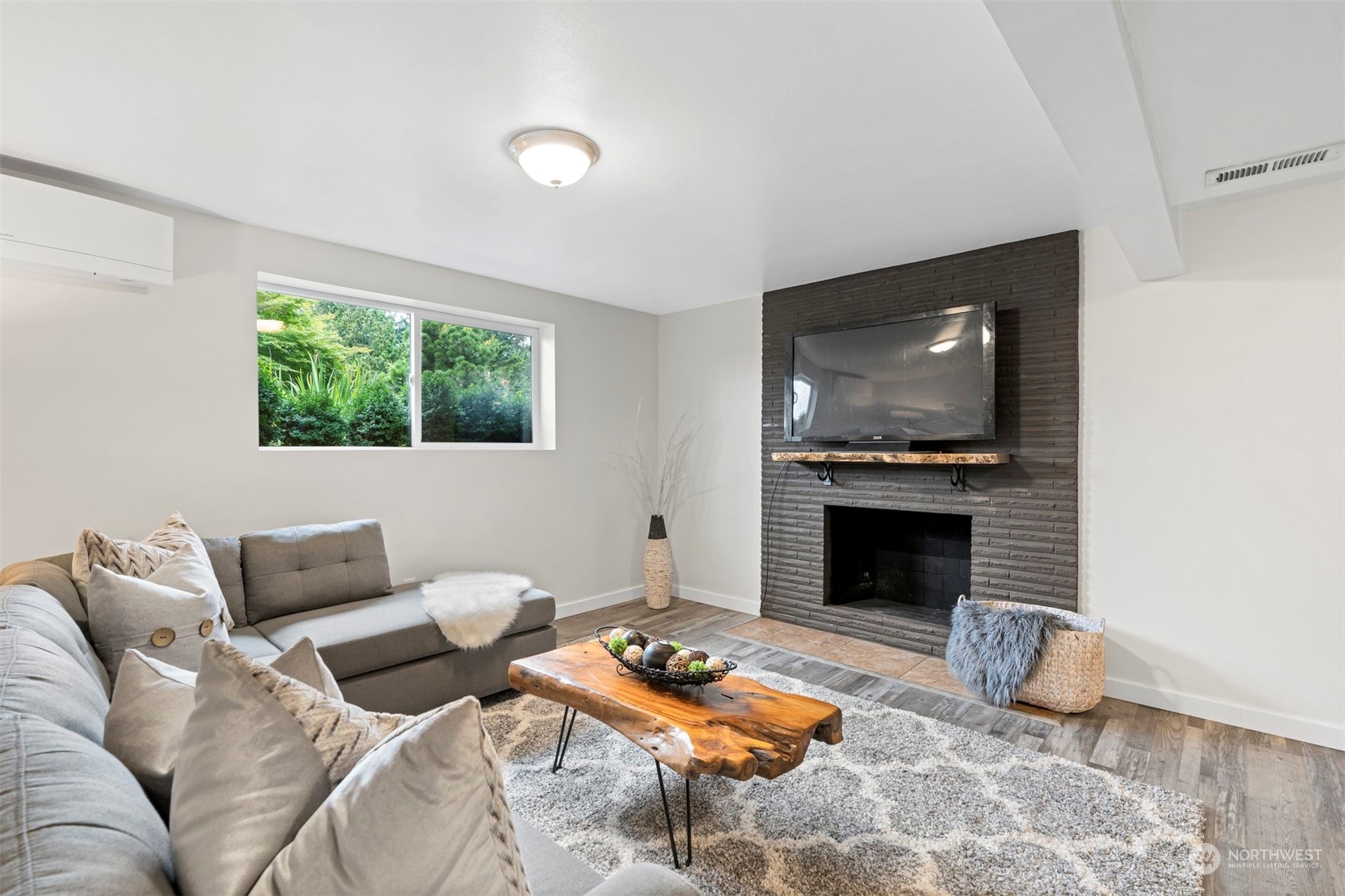 24301 7th Place West Bothell, WA 98021 - Photo 17 of 40 a living room with furniture and a fireplace