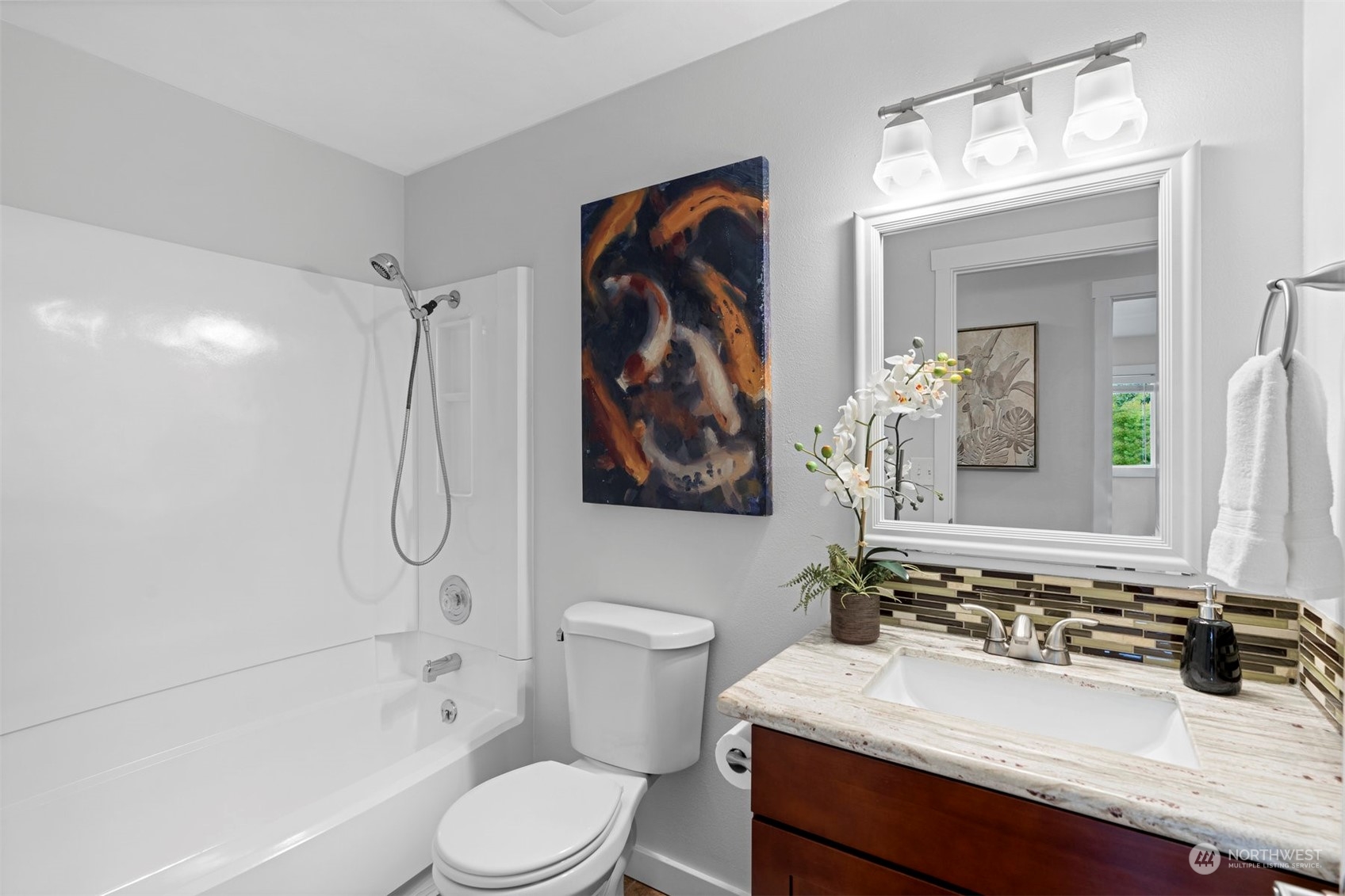 24301 7th Place West Bothell, WA 98021 - Photo 19 of 40 a bathroom with a sink a toilet and shower