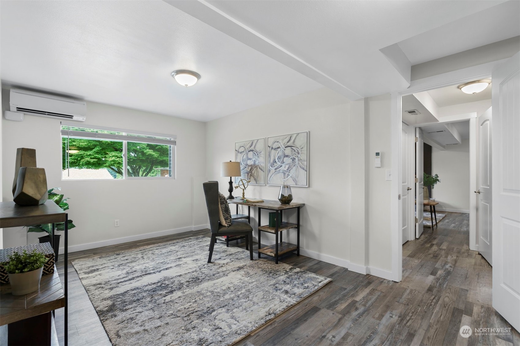 24301 7th Place West Bothell, WA 98021 - Photo 21 of 40 a view of a dining room with furniture window and wooden floor