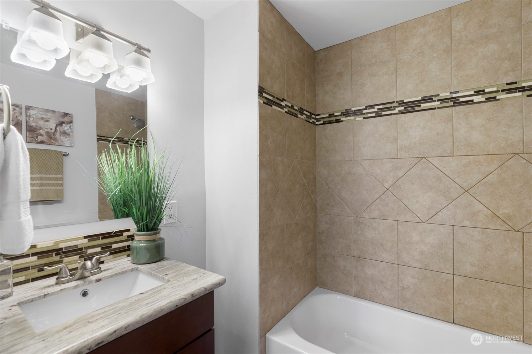 24301 7th Place West Bothell, WA 98021 - Photo 23 of 40 a bathroom with a sink and a mirror