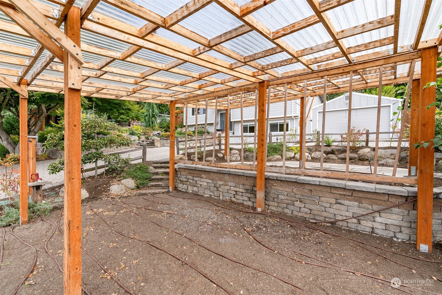 24301 7th Place West Bothell, WA 98021 - Photo 28 of 40 a view of a porch with a bench