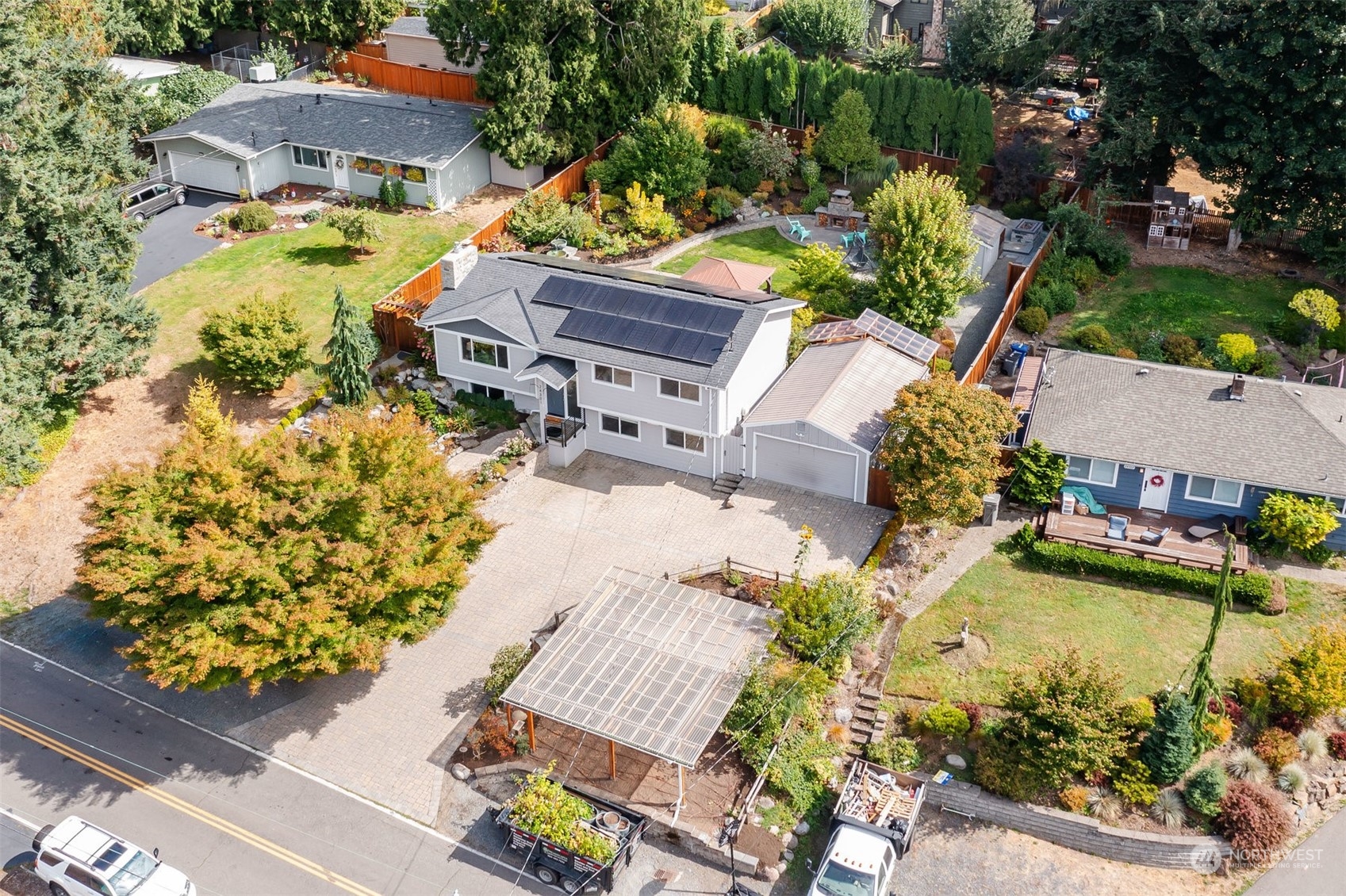 24301 7th Place West Bothell, WA 98021 - Photo 36 of 40 an aerial view of a house with a garden and lake view