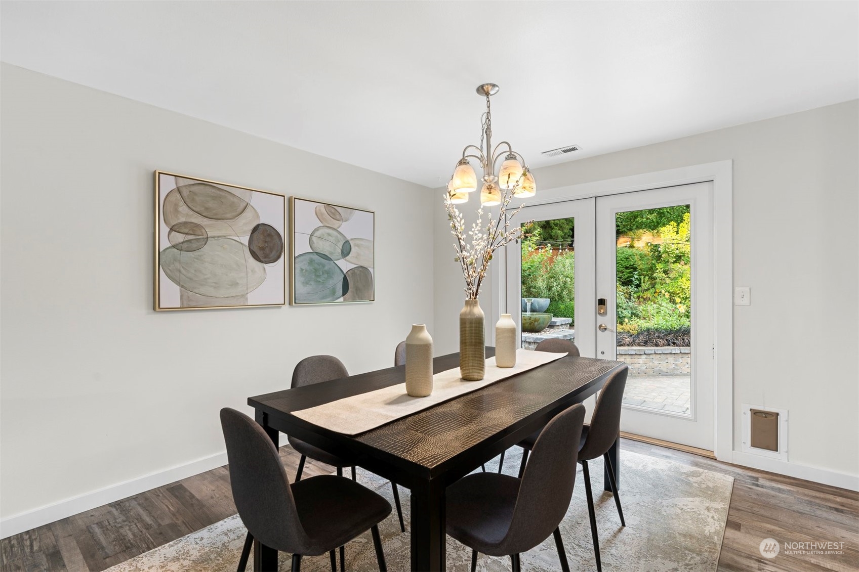 24301 7th Place West Bothell, WA 98021 - Photo 8 of 40 a dining room with furniture a rug and a painting