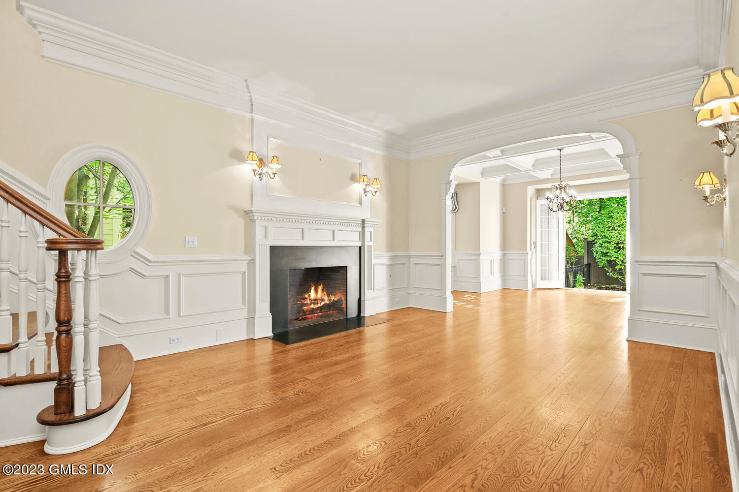 100 East Elm Street, Unit 1 Greenwich, CT 06830 - Photo 2 of 27 a view of empty room with fireplace and wooden floor